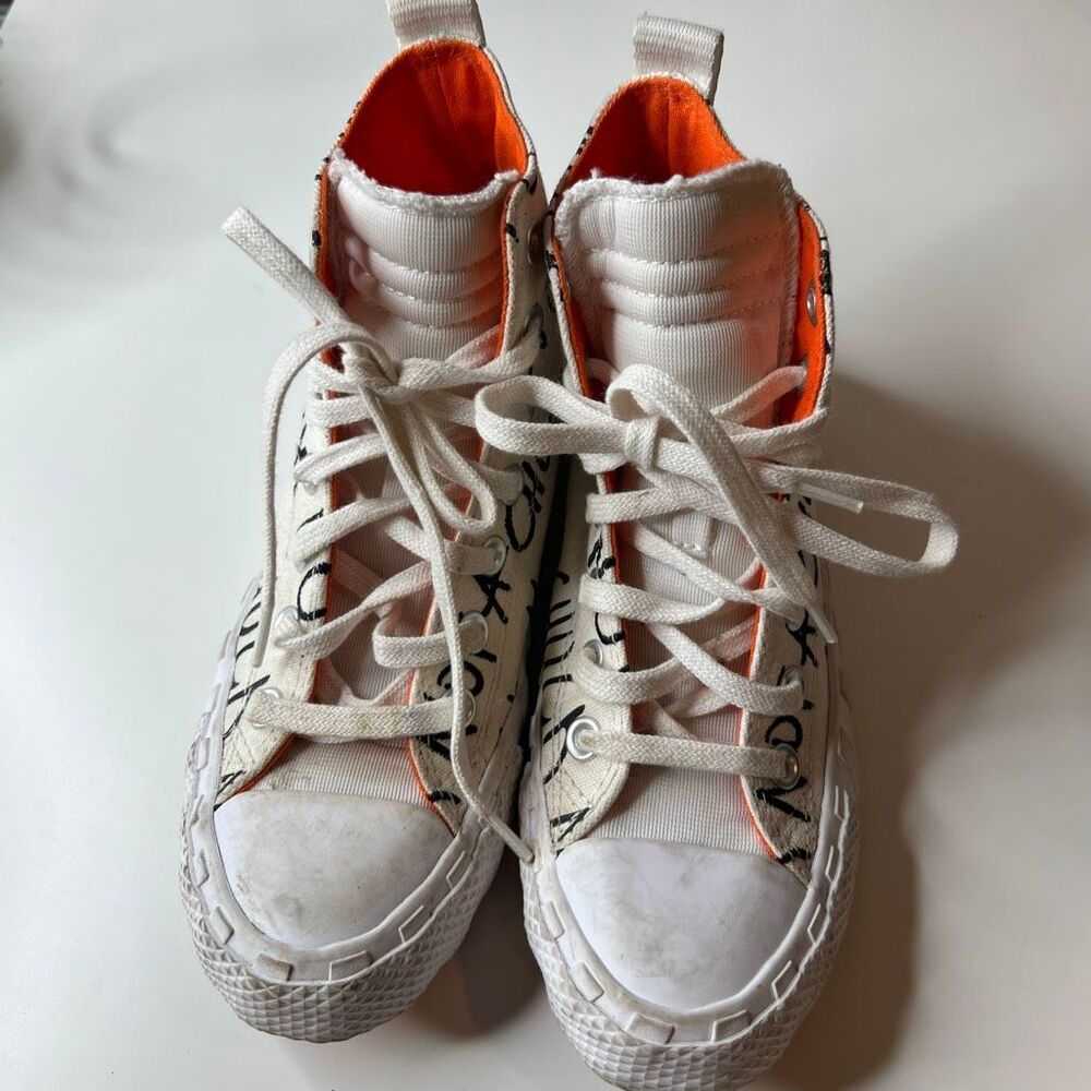 Converse Chuck Taylor All-Star 70 Hi "Not a Chuck" sneakers bold black text on w